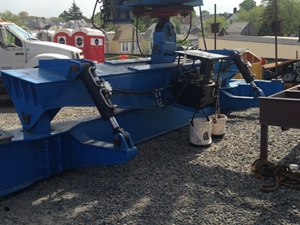 Hydraulic manipulator for roadway segment positioning